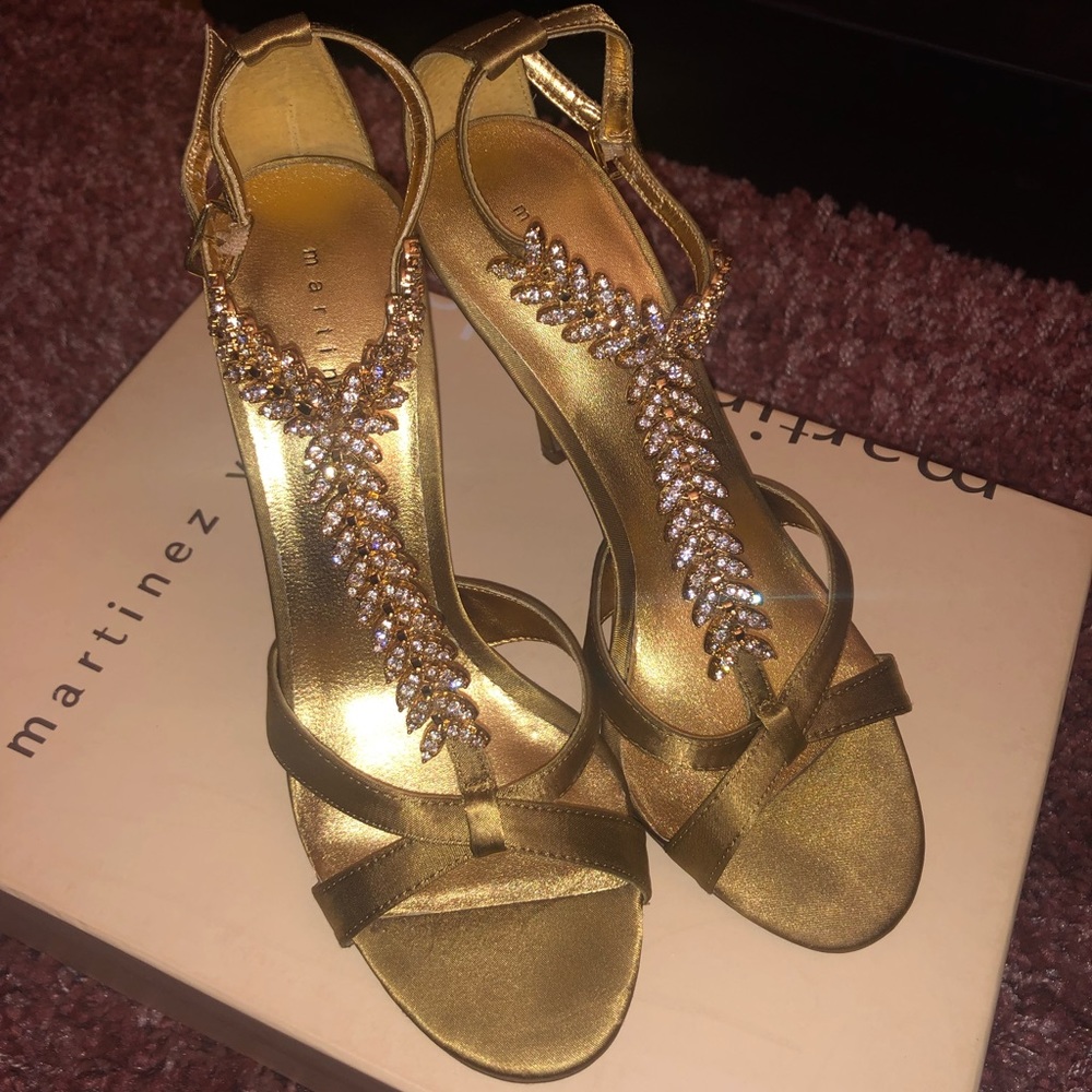 Gold and crystal hug heel sandal.